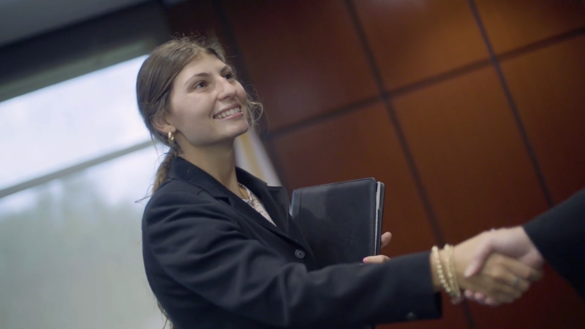 Business interview student shaking hand